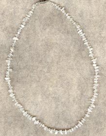 Select rainbow moonstone chips strung with seed beads and finished with nickel-plated barrel clasp